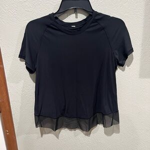 Lululemon Women's Black Short Sleeve Top with Sheer Hem Size 4 Cropped fit